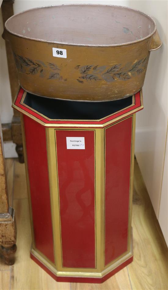 A sepia painted tole-peinte oval two handled jardiniere and an octagonal gilt and red painted stick stand